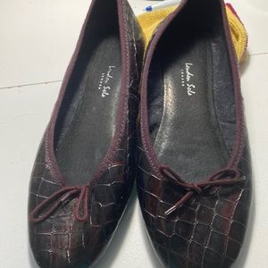 London Sole ballet flats.  Slight wear. Really a dark burgundy color.